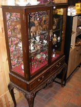 A Victorian display case, glazed to three sides, o