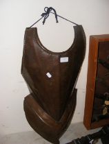 An antique breastplate - approx. 68cm x 33cm