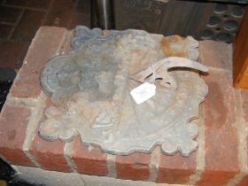 An old decorative lead wall sundial