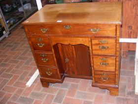 A Georgian mahogany ladies writing desk with seven