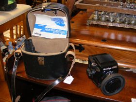 A Mamiya 645 camera, together with Mamiya - Sekor