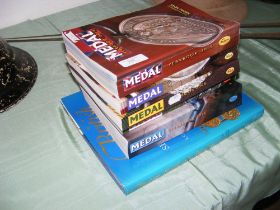A selection of books relating to medals
