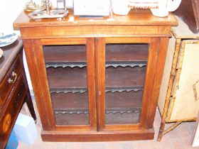 An antique Victorian mahogany bookcase with glazed