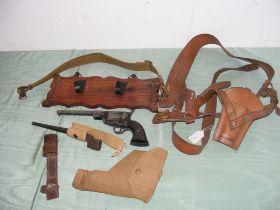 A selection of leather holsters, etc.