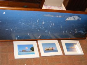 A framed photo of The Americas Cup Jubilee sailing