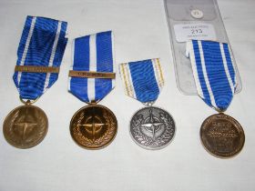 Four Nato medals - one with box (box in office)