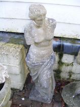 A statue of a partially robed woman - height 88cm