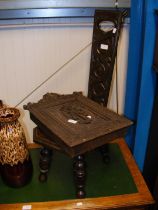 A carved wooden seat, together with key box