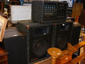 A Sunn amplifier and speakers together with four E