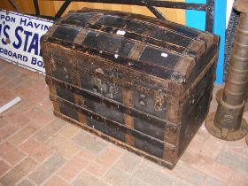 An antique dome top trunk