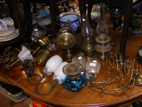 Assorted wall lighting including gimbled brass oil