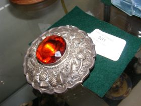 An 8cm diameter Scottish silver brooch