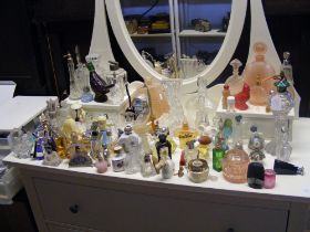 A large quantity of collectable perfume bottles