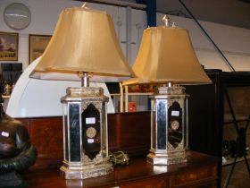A pair of French style mirrored base table lamps