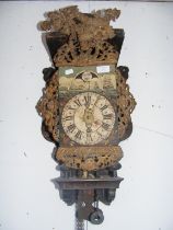 An antique Dutch wall clock - 75cms long