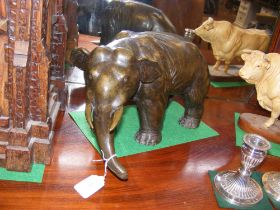 A heavy cast bronze elephant ornament - 37cms long