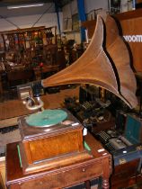 An early HMV oak cased wind up gramophone with woo