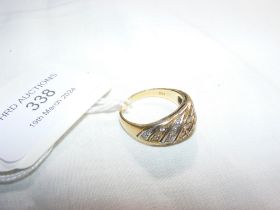 An 18ct gold and diamond mounted 'swirl' ring