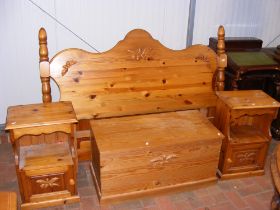 A pair of pine bedside cabinets, a double bed head