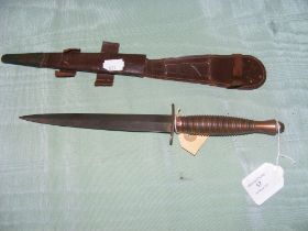 A Fairbairn Sykes style fighting knife with ribbed