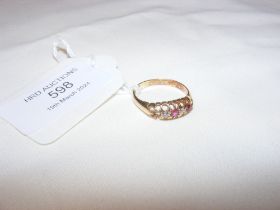 A diamond and ruby ring in 18ct setting