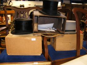 A Lincoln Bennett & Co. top hat together with two