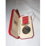 A King George V British Empire medal to Walter George Linington in presentation case