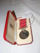 A King George V British Empire medal to Walter George Linington in presentation case