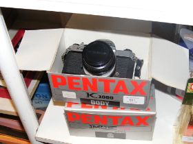 A Pentax K1000 and Pentax ME Super camera