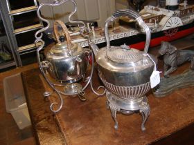 An antique silver plated spirit kettle, together w