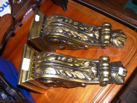 A pair of gilded wall sconces