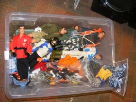 A quantity of Action Man figures and clothes