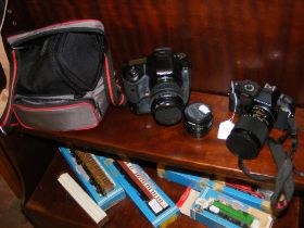 A Pentax P30 camera, Pentax K10, plus lenses and c
