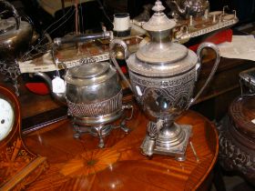 An antique silver plated two handled samovar, toge