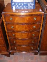 A serpentine chest of five drawers - width 54cm