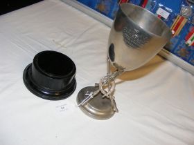 A silver plated military cup on stand - presented