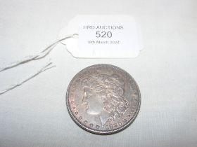 A silver 1880 one dollar coin