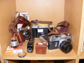 Vintage photographic equipment, including a Konica