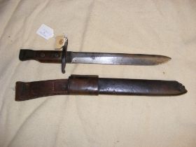 A bayonet in leather scabbard - overall length of