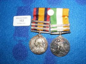 A Queen's South Africa medal with three clasps to