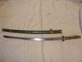 An oriental curved sword with green lacquered scab