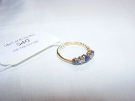 An 18ct sapphire and diamond ring
