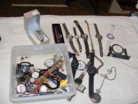 A selection of costume jewellery, wrist watches et