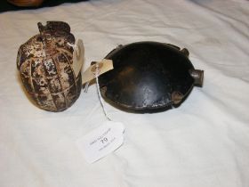 A decommissioned oyster grenade, together with one