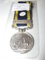 A Victoria Punjab medal with Mooltan clasp - unnam
