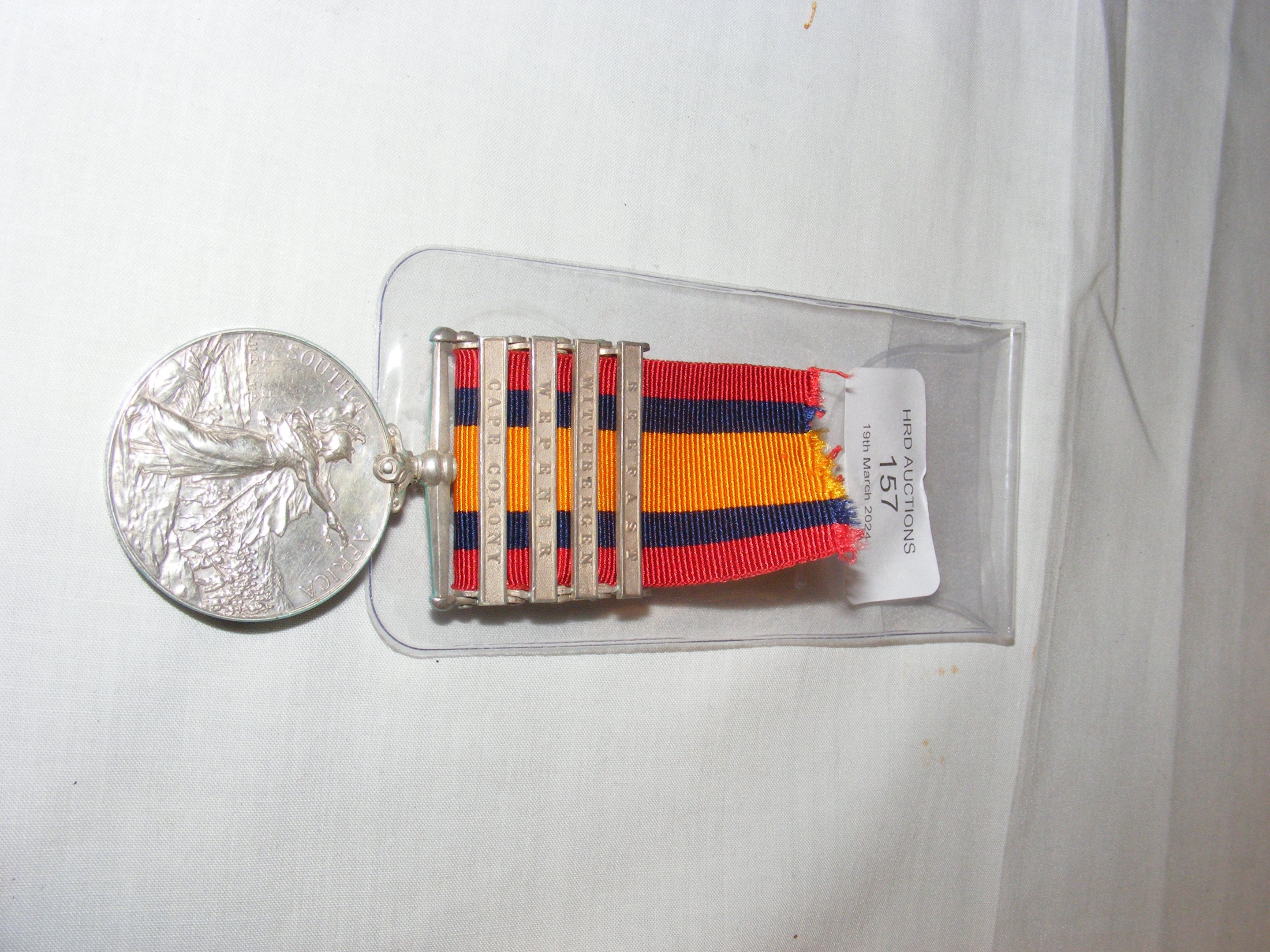 A full size original Queen's South Africa medal wi