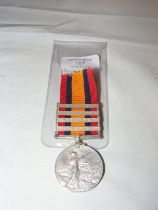 A full size original Queen's South Africa medal wi