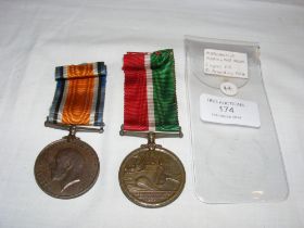 A First World War medal with an inscription to rim