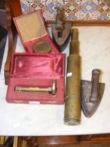 A brass telescope, together with Victorian irons,