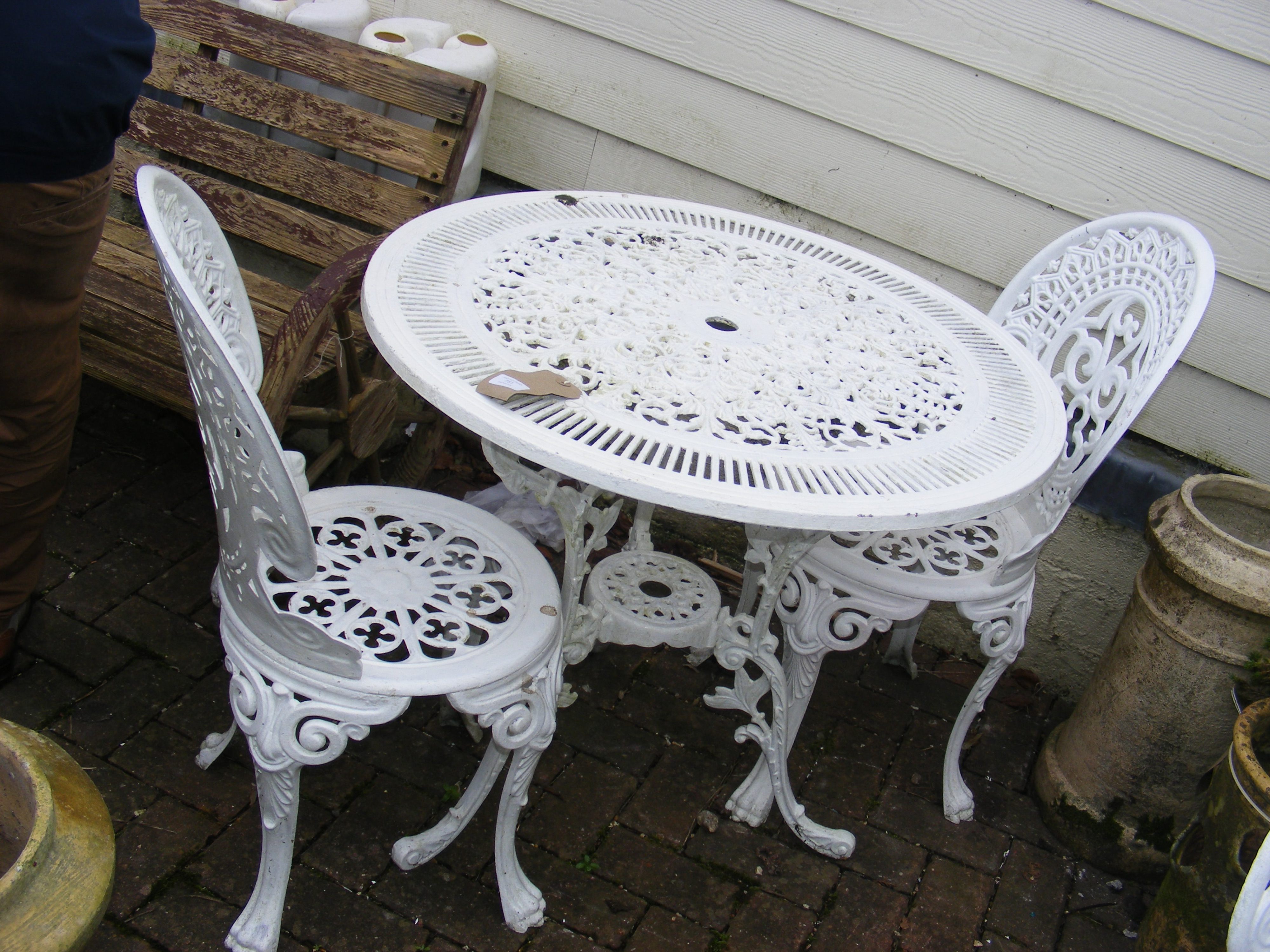 A Victorian style painted white aluminium circular